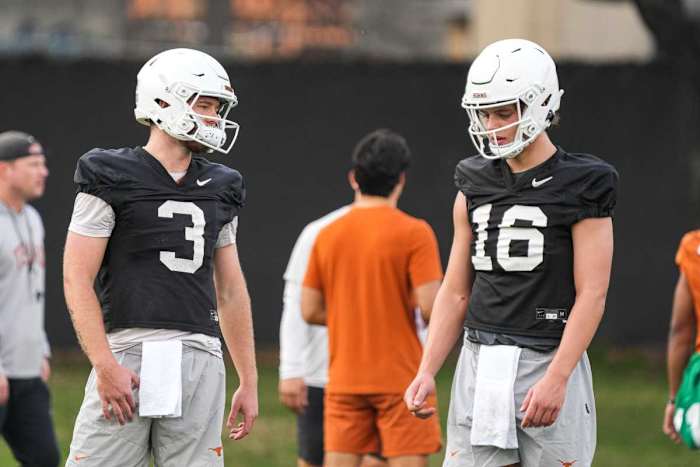 Quarterbacks Quinn Ewers (3) and Arch Manning (16) talk during the first Texas Longhorns football practice of 2023 at the Frank Denius Fields on the University of Texas at Austin campus on Monday, March 6, 2023. Aem Texfoot First 2023 Practice 14